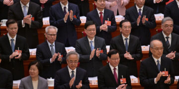 李家超北京列席人大會議開幕會